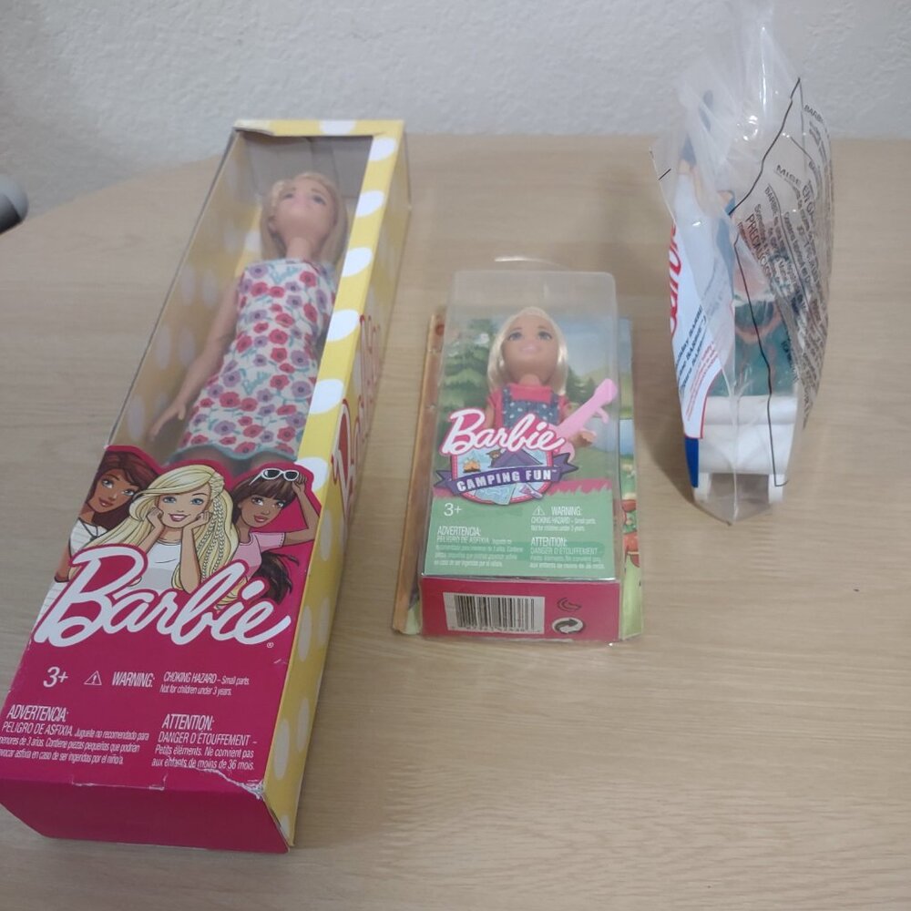 A set of 3 Barbie dolls